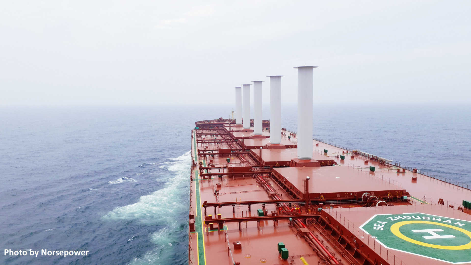 Bulk carrier with six Flettner rotors for wind propulsion at sea