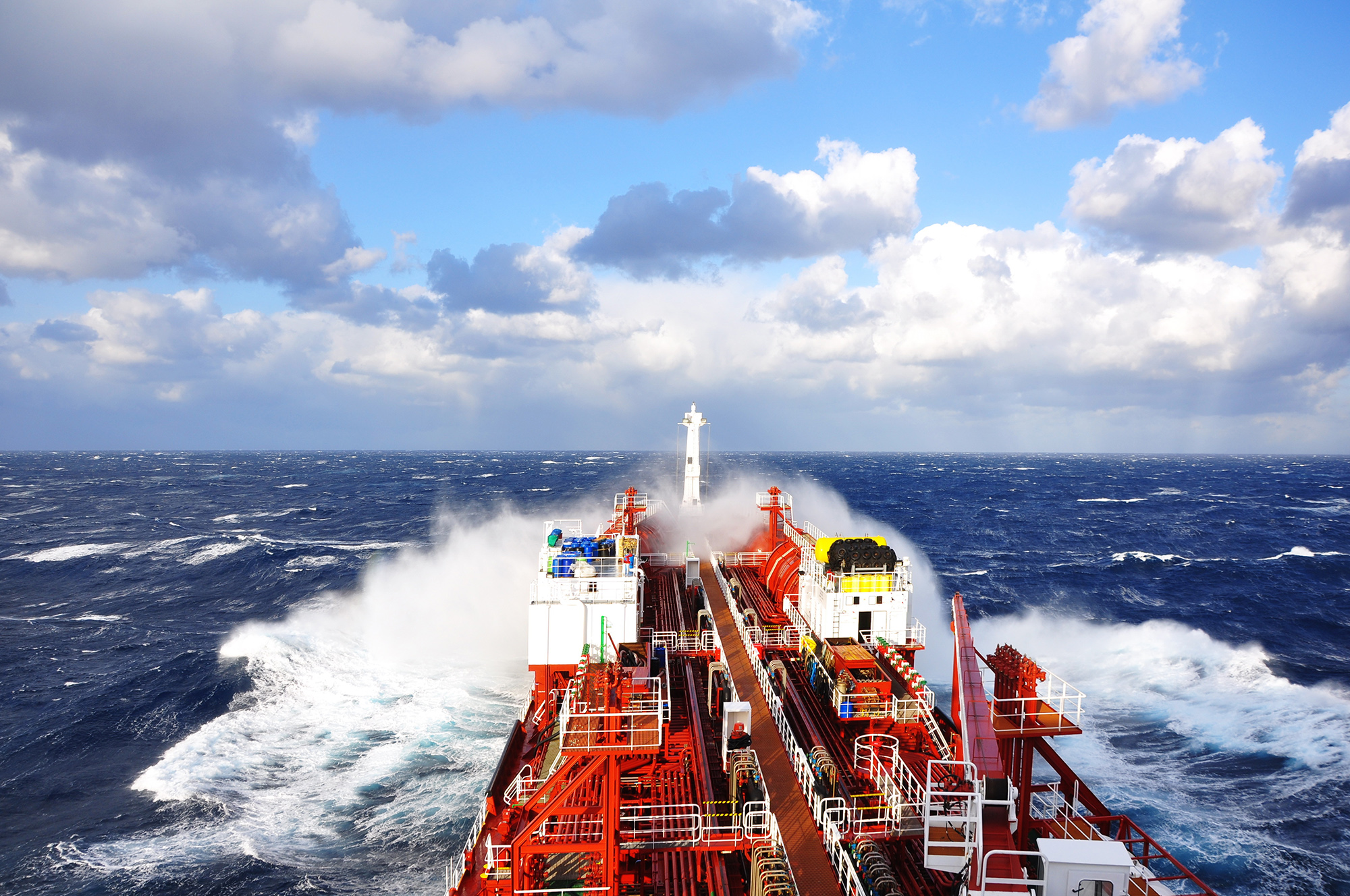 argo ship sailing through rough sea conditions